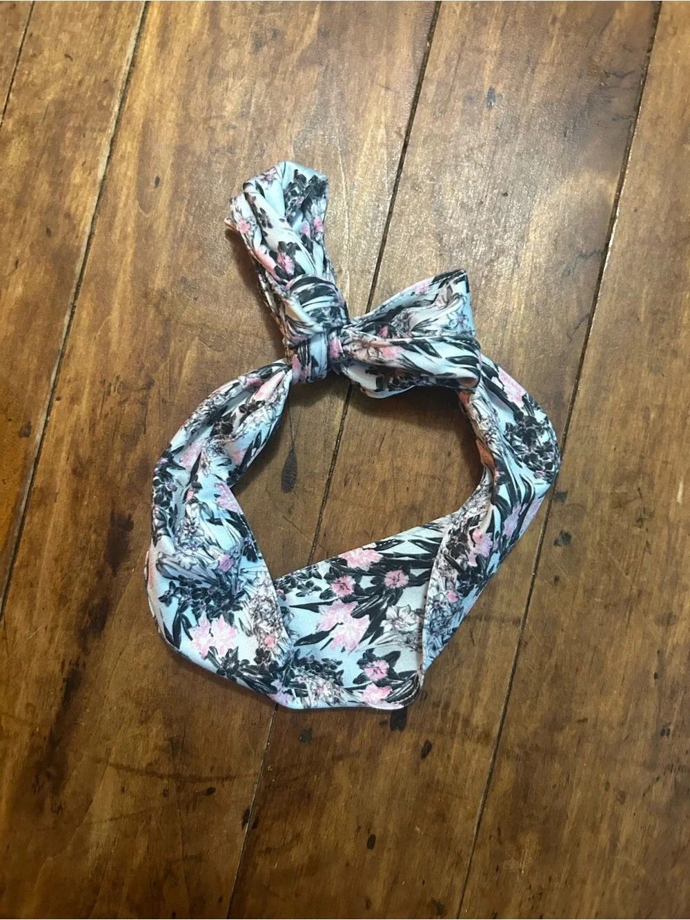 1 Floral blue pink and black Nike headband and 1 orange white and green headband